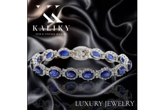 سوار تنس من الذهب الأبيض عيار 14 قيراطًا مرصع بحجر الياقوت الأزرق والزركون tbc001w