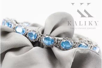 Тенісний браслет з білого золота 14k з аквамарином та цирконами tbc001w