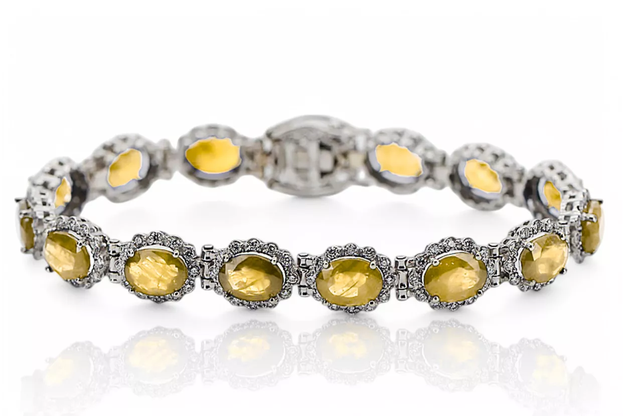 Bransoletka tenisowa z białego złota 14k 585 z peridotem i cyrkoniami tbc001w