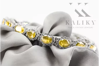 Тенис гривна от бяло 14-каратово злато с перидот и циркони tbc001w