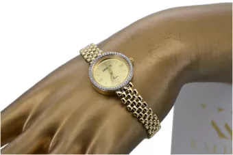 This is a 14K Geneva, Italian, zirconia, 23mm gold watch